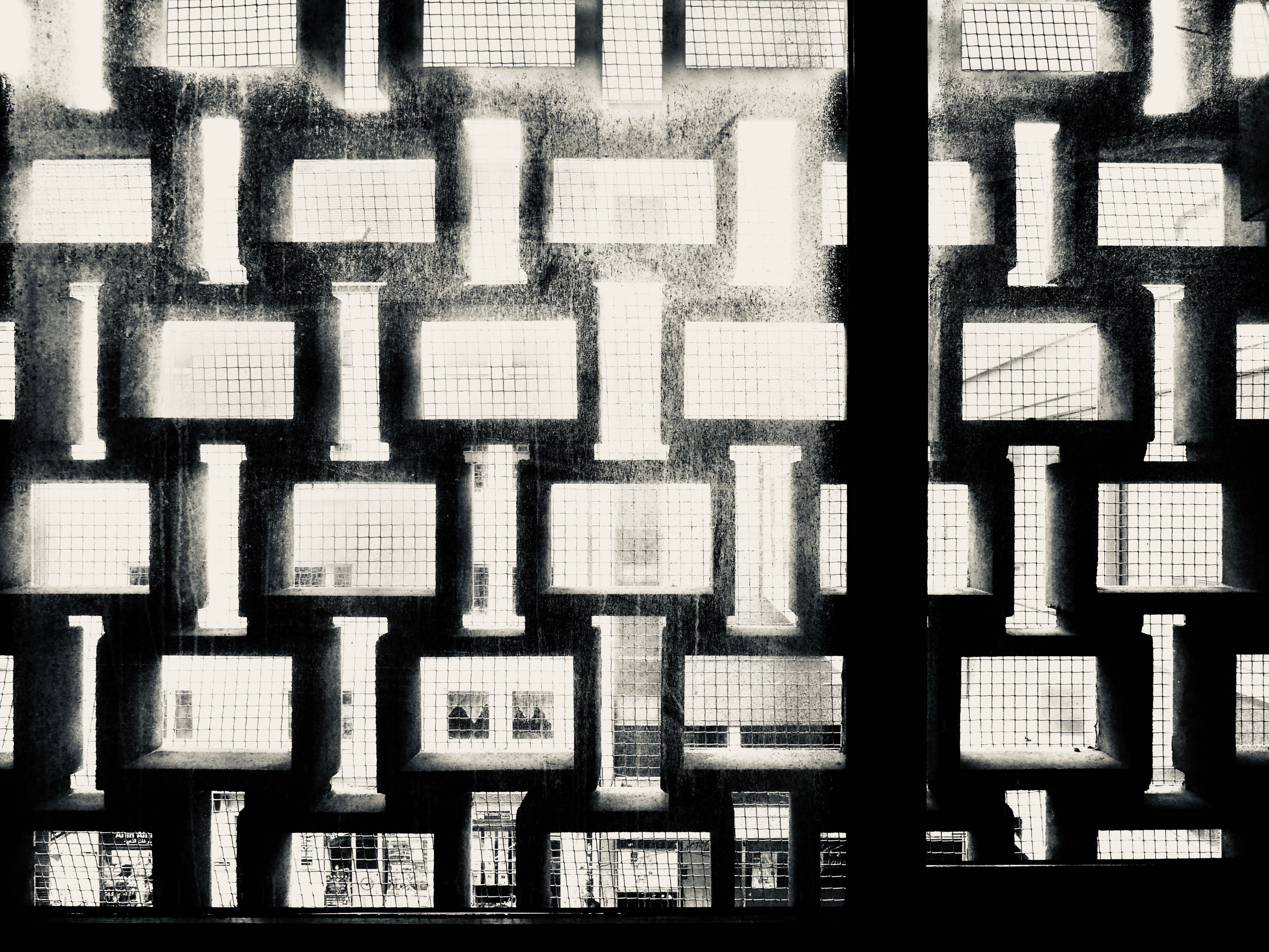 light falling through the grid façade of horten aufsessplatz